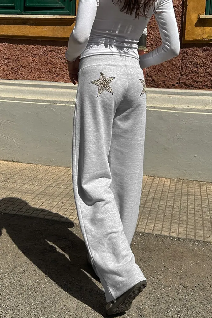 Donna Subdued Pantalone tuta wide-leg con stelle patch
